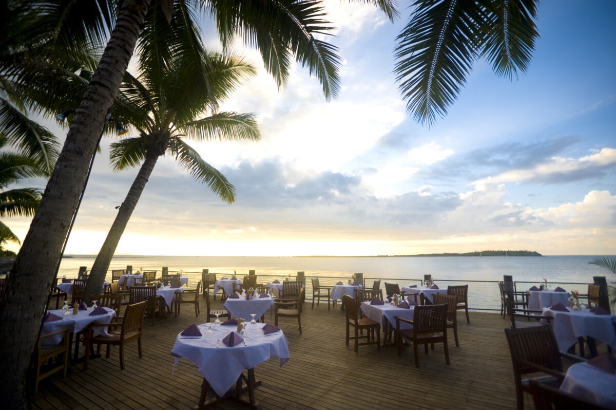 Outdoor Resort beach restaurant at sunset