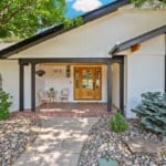 A beautifully manicured outdoor entryway