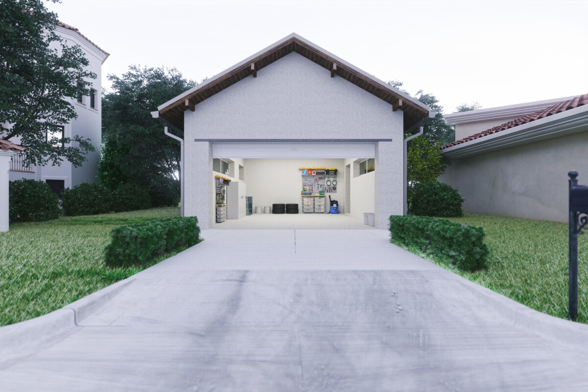 Open door of a modern garage with a concrete driveway at the urban district