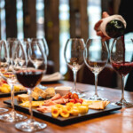 Sommelier serving glasses of winetasting event