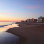 Virginia Beach shoreline at dawn. Virginia Beach is an independent city located in the U.S. state of Virginia. Virginia Beach is a resort city, and the Oceanfront is a main tourist attraction. The city is known for its pristine beaches, coastal cuisine and entertainment.