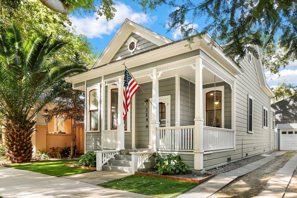 gray and white bungalow with columns 