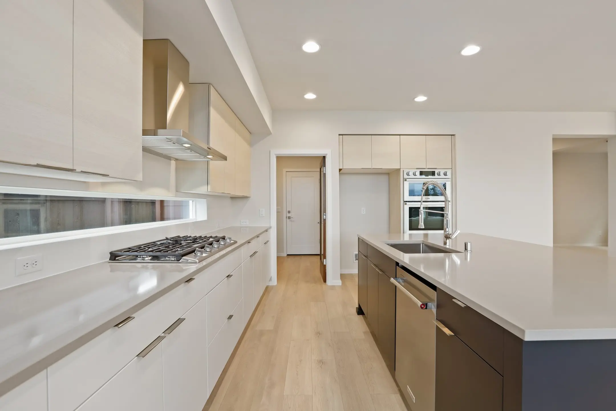 white cabinetry sleek modern kitchen