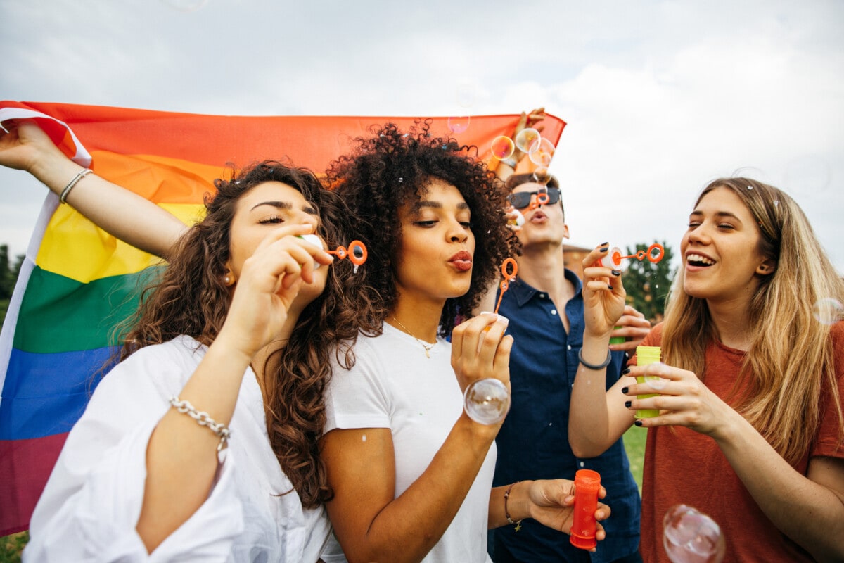 Pride day celebrations, people blowing bubbles