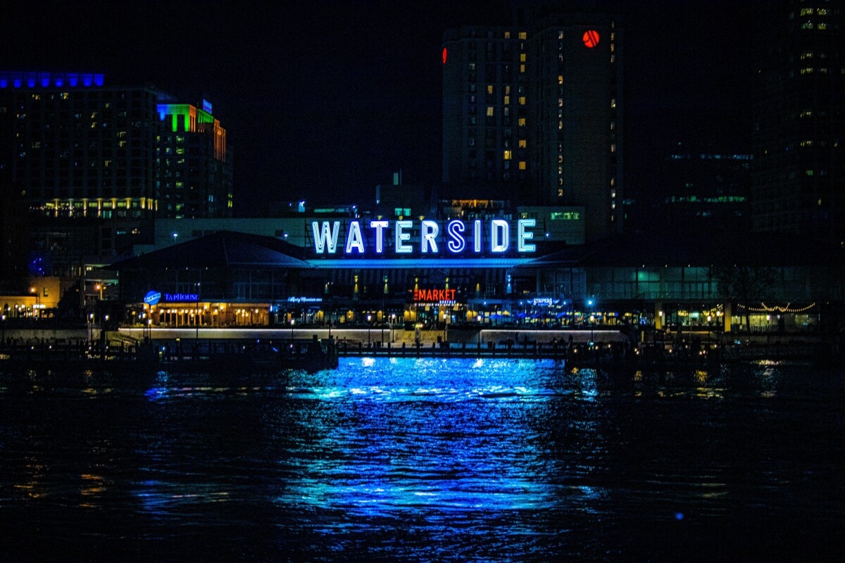 norfolk virginia at night with lit up sign