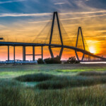 The Ravenel Bridge crosses the Cooper River and connects Charleston with Mount Pleasant South Carolina. It is 13,200 feet long (2.5 miles) and is the third longest cable stayed bridge in the Western Hemisphere.