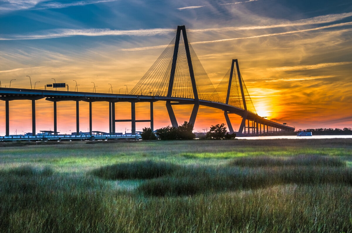 Getty - The Ravenel Bridge crosses the Cooper River and connects Charleston with Mount Pleasant South Carolina. It is 13,200 feet long (2.5 miles) and is the third longest cable stayed bridge in the Western Hemisphere.