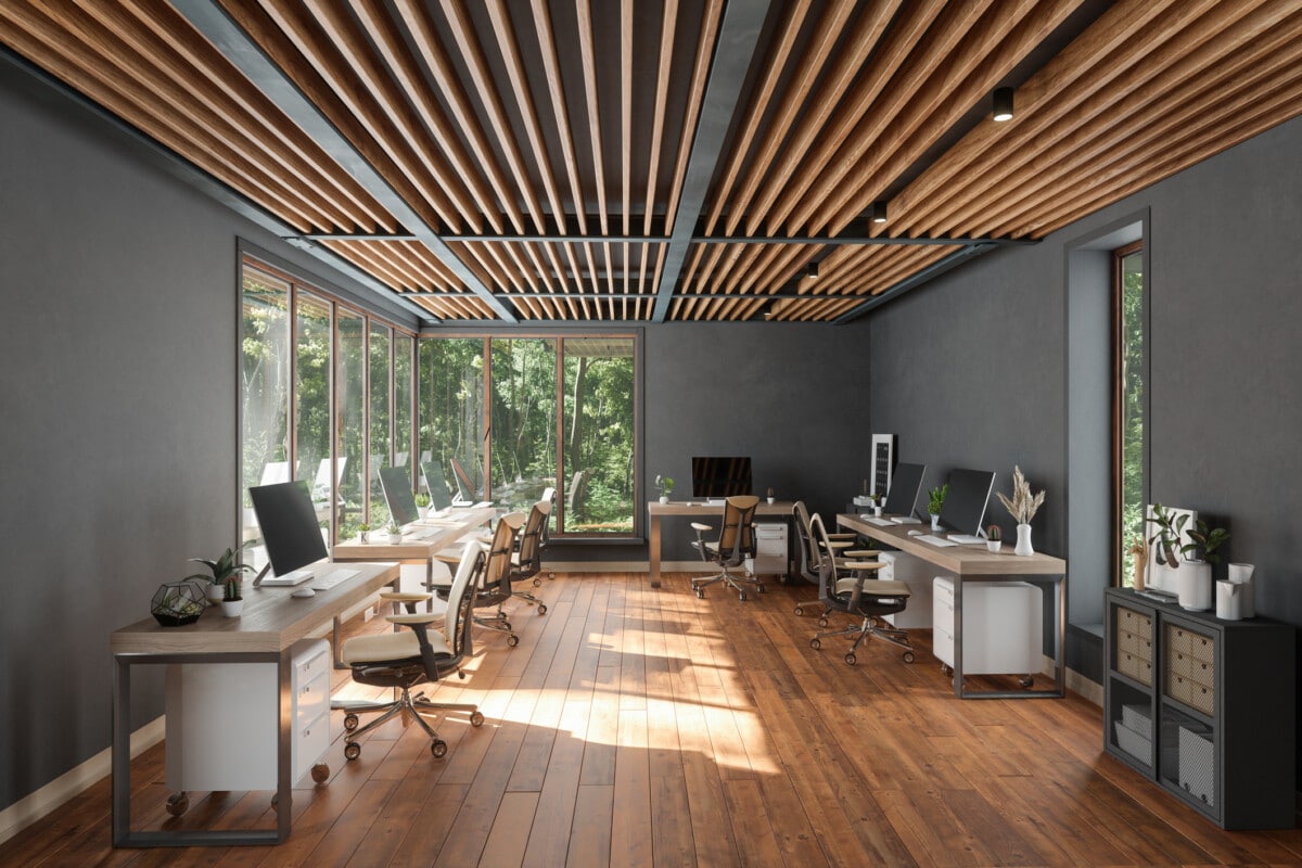 Modern Open Plan Office Interior With Tables, Office Chairs, Parquet Floor And Garden View From The Window