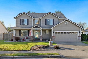 two story home in puyallup with large front yars