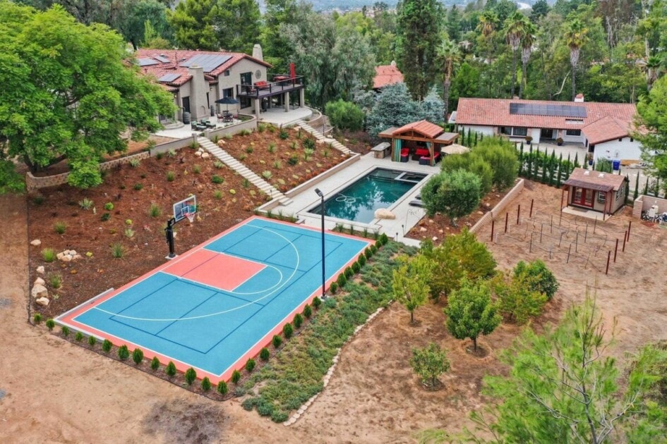 Home in San Diego with a pool and sport court, a luxury home feature in San Diego