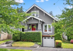 home successful  tacoma with trees and porch