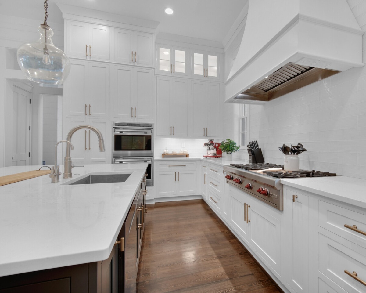 Sleek white kitchen with high end appliances