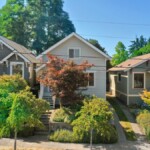 Row of homes with healthy shrubs