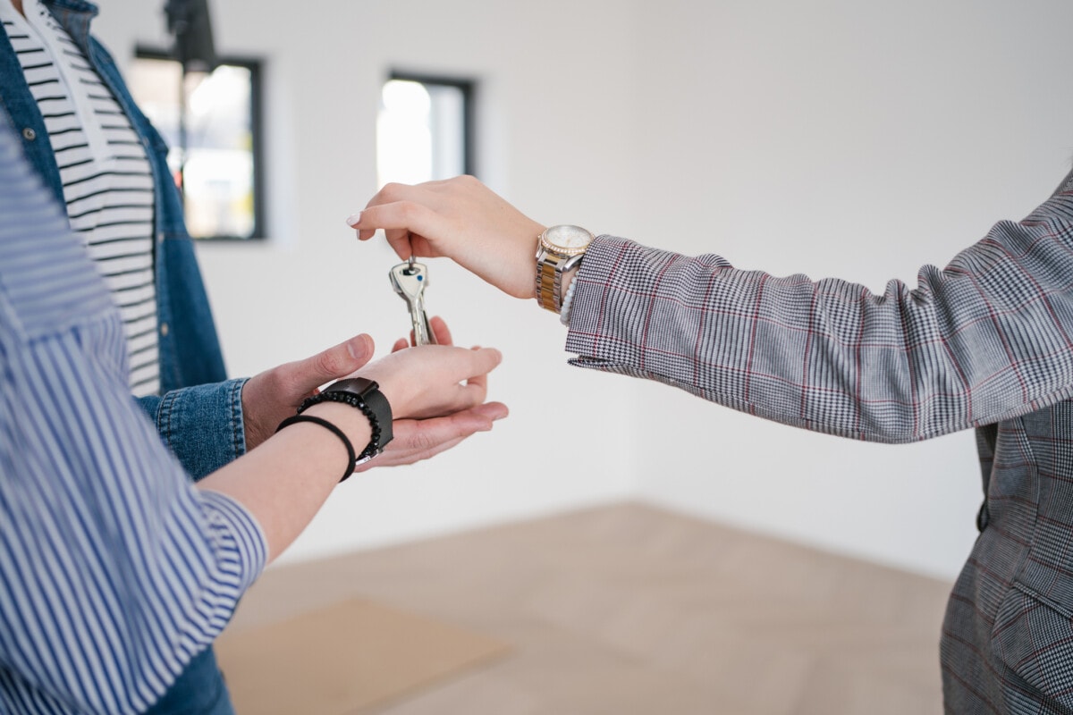 Landlord giving the tenants the keys