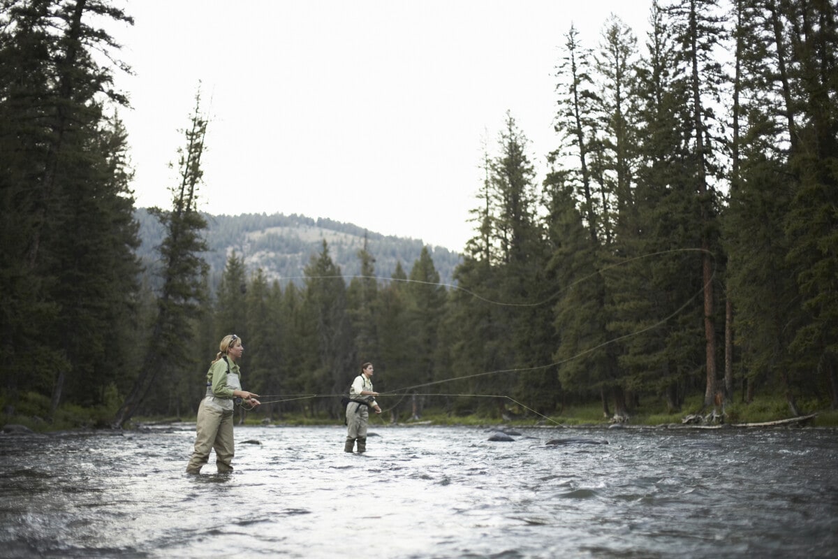 Two women fly-fishing in Montana