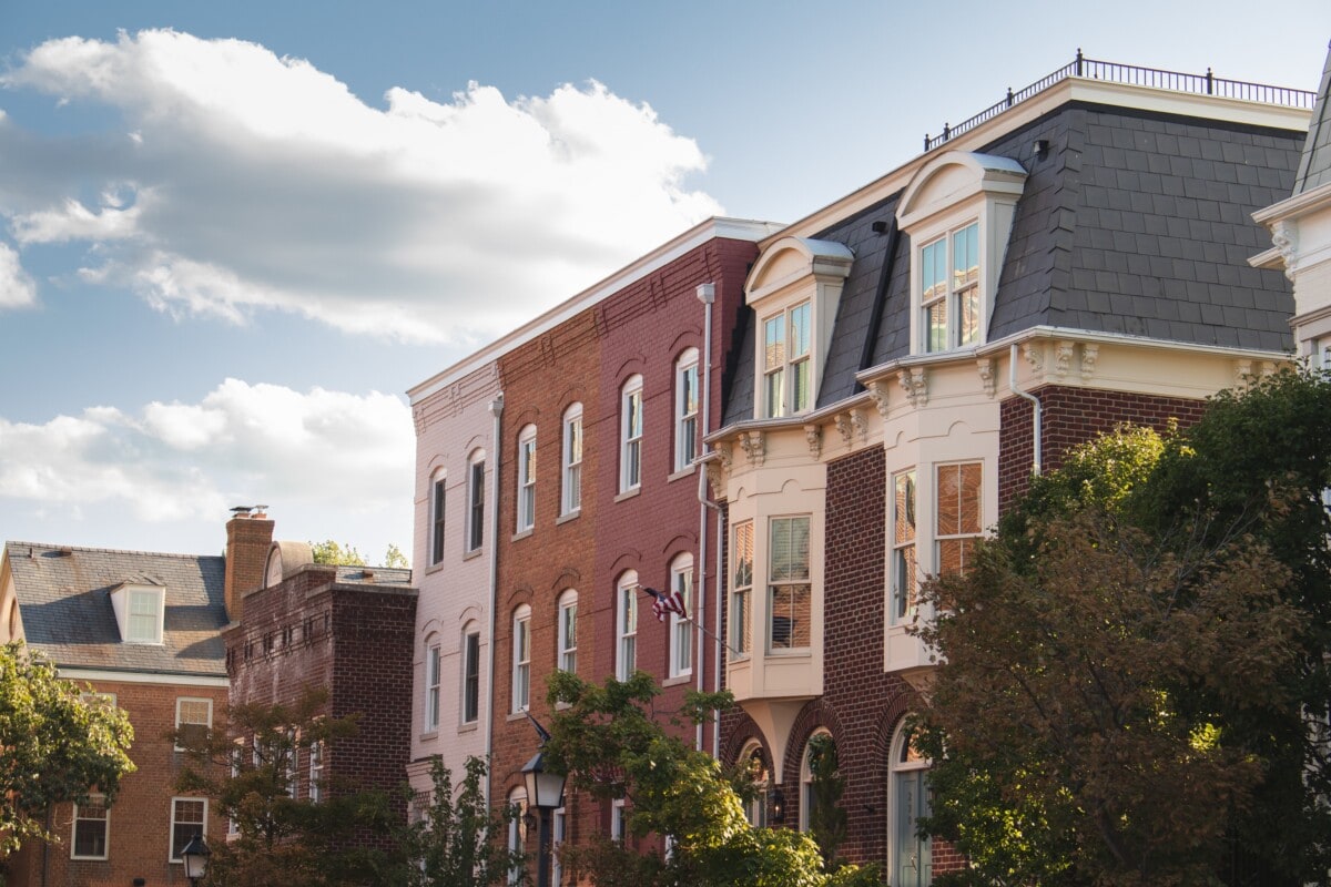 row homes in alexandria virginia with clouds in the background