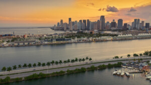 Aerial view of Dodge Island with Miami skyline in the background during sunset in Florida, USA.