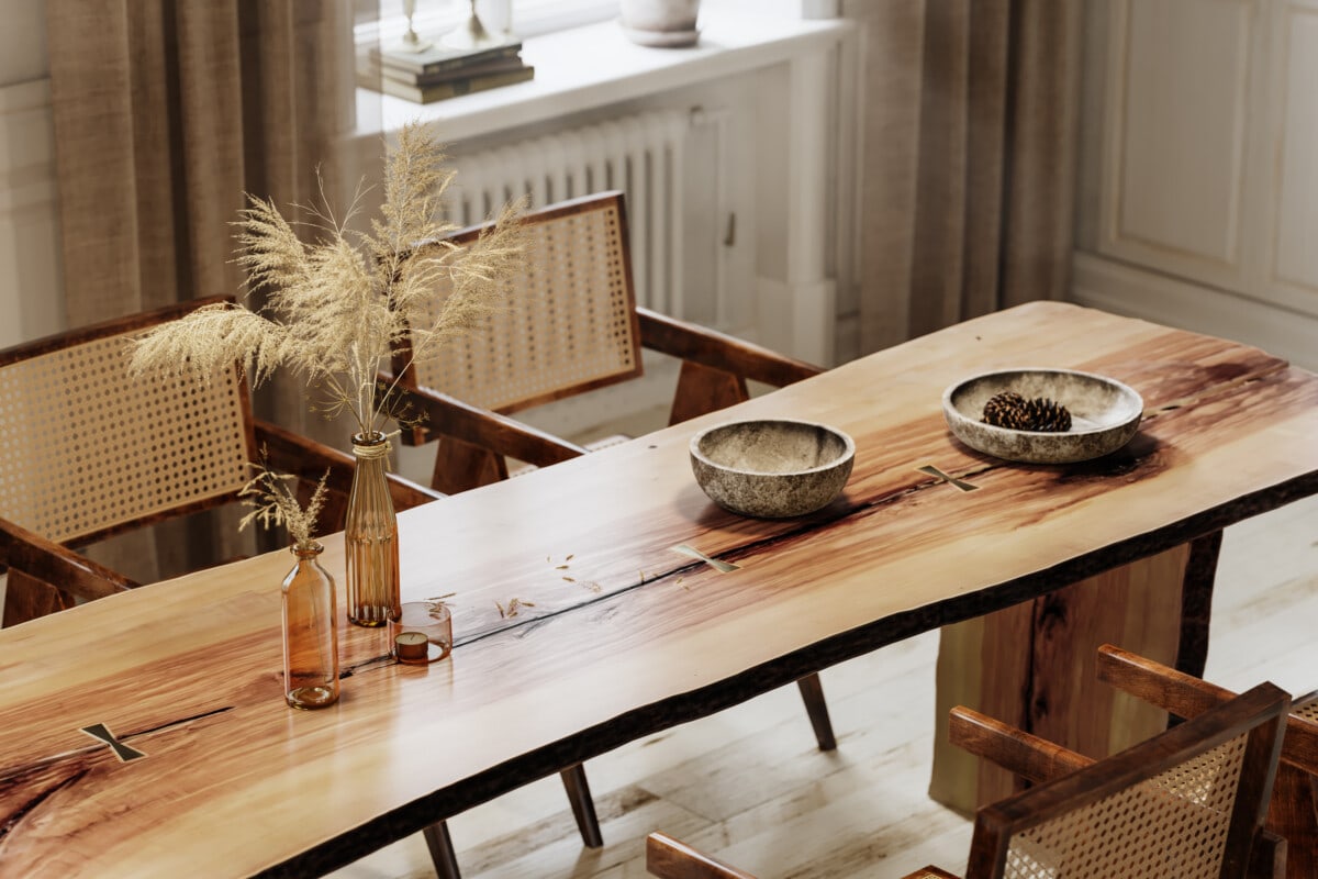 wooden dining chairs and table with decorative objects