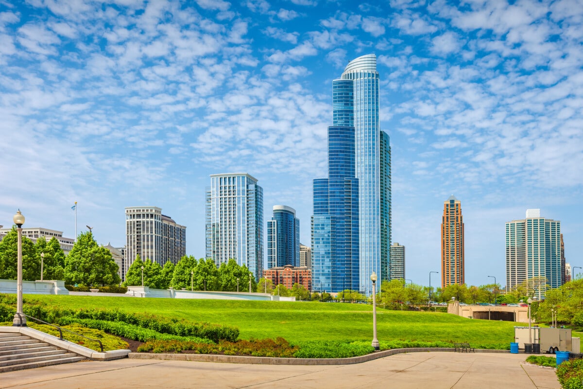 Condos in downtown Chicago Illinois USA and the Lakefront Trail in Grant Park on a sunny day.