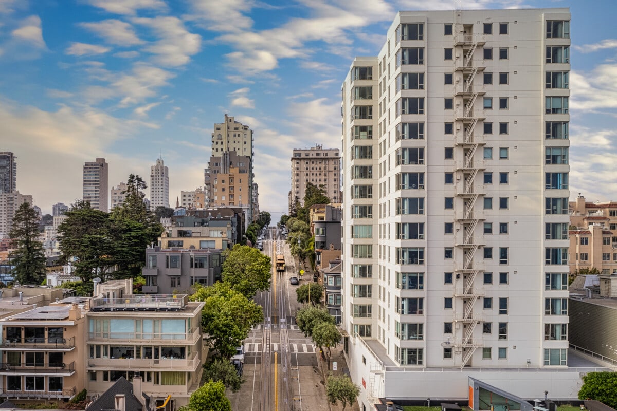 An aerial view of the trolley car going up the hill on Hyde Street In San Francisco