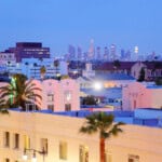 Hollywood is a district in Los Angeles, California, United States situated west-northwest of downtown Los Angeles. Due to its fame and cultural identity as the historical center of movie studios and movie stars, the word Hollywood is often used as a metonym of American cinema.