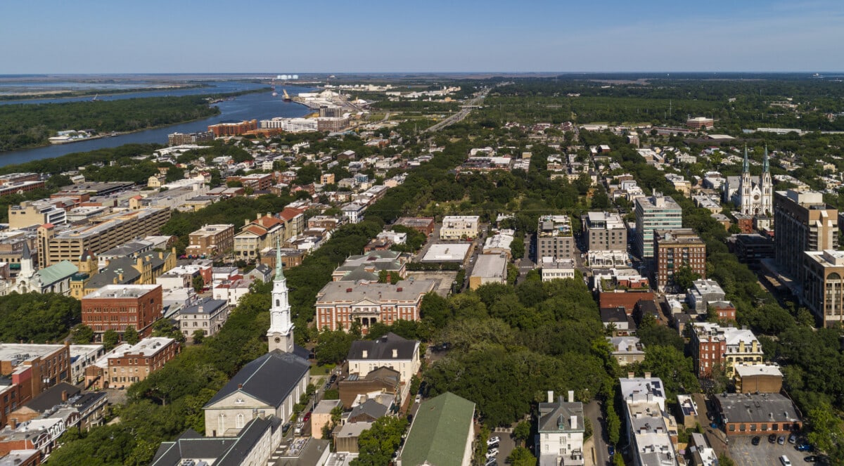 Scenic view of the Historic District in Downtown Savannah, Georgia, with Independent Presbyterian Church in the foreground, in the evening before sunset.