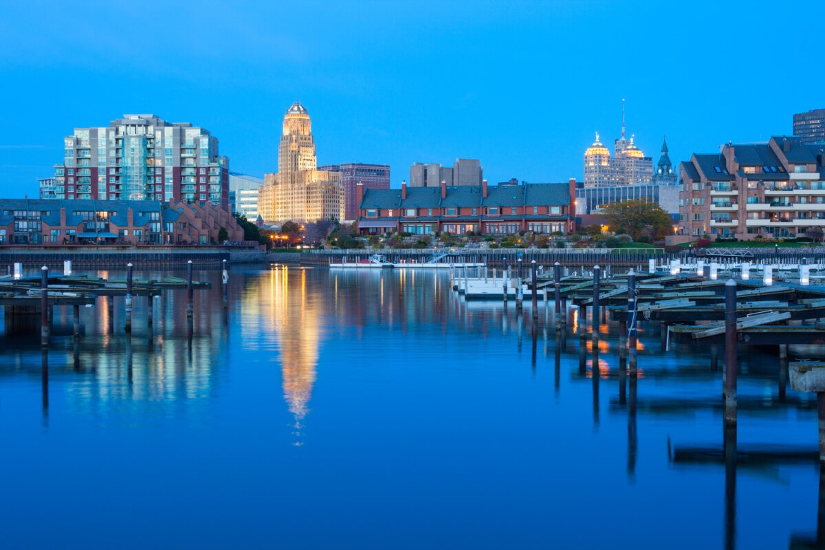 View of downtown Buffalo with City Hall reflecting in Lake Erie.