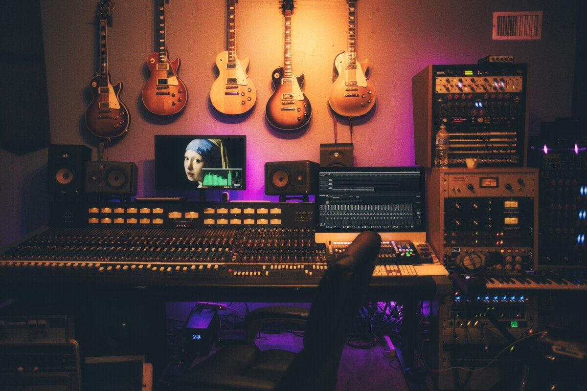 A studio with guitars on the wall