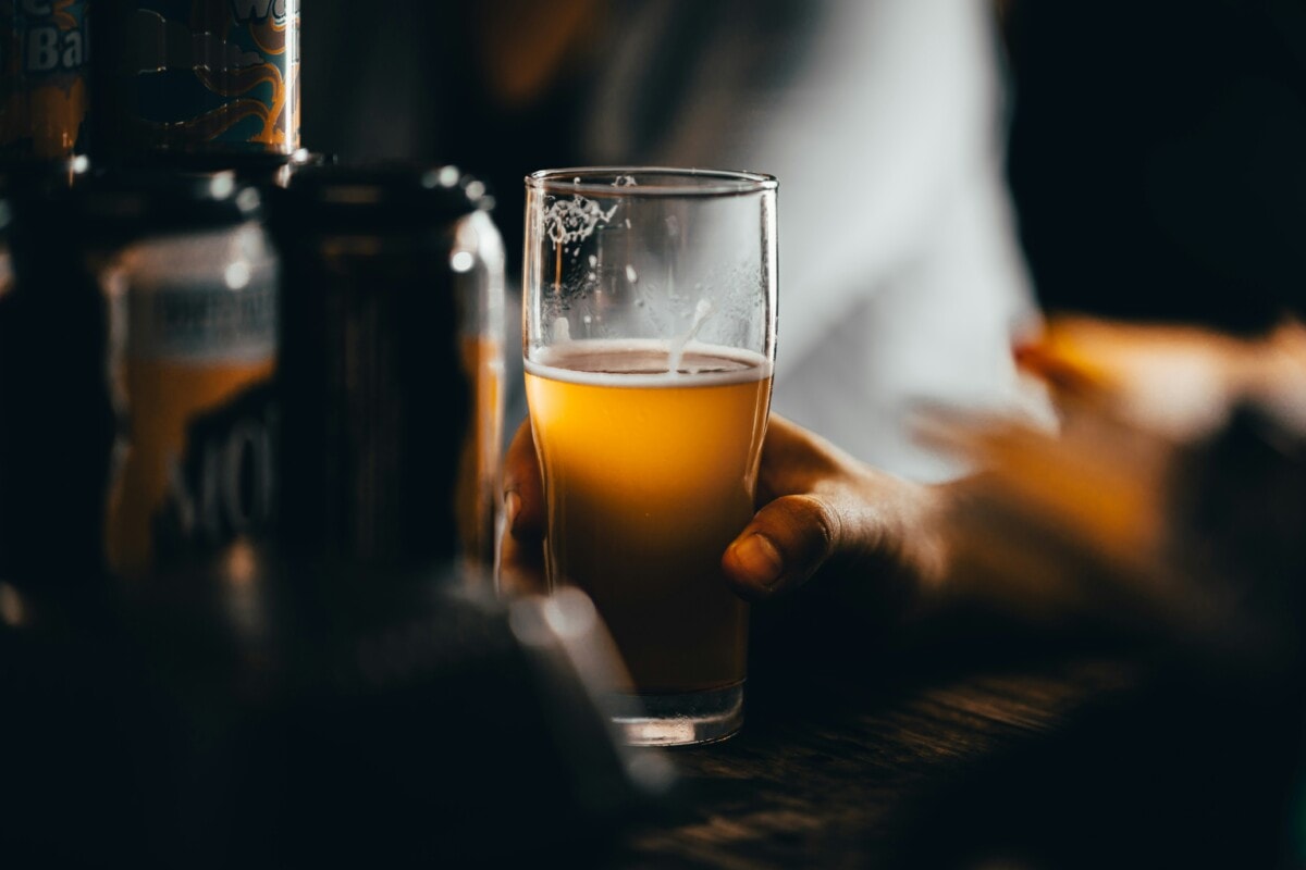 A beer being poured into a glass