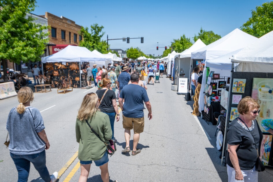 Attendees stroll through the downtown streets of the Edmond Arts Festival