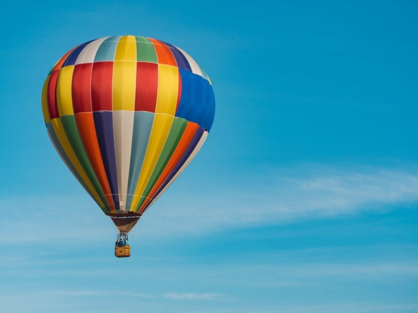 A hot air balloon against a clear blue sky