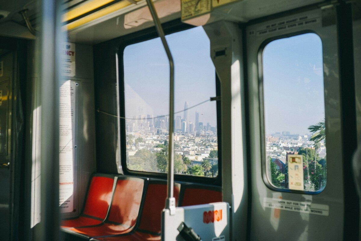 view of downtown san diego in the distance from public transportation