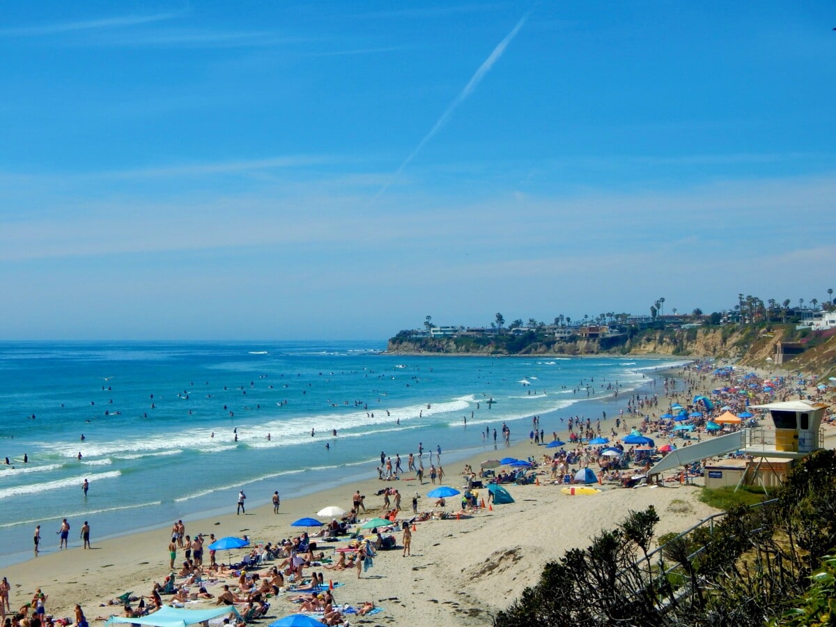 crowded pacific beach san diego on a sunny day