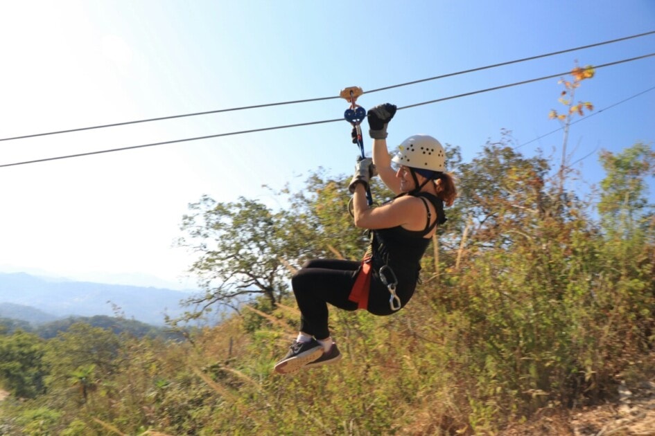 A woman crosses an item off her Oklahoma City Bucket List by going ziplining