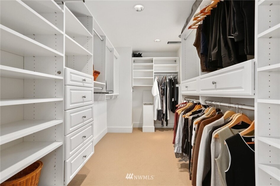 Closet with clothes hangers, an home essential for new homeowners.