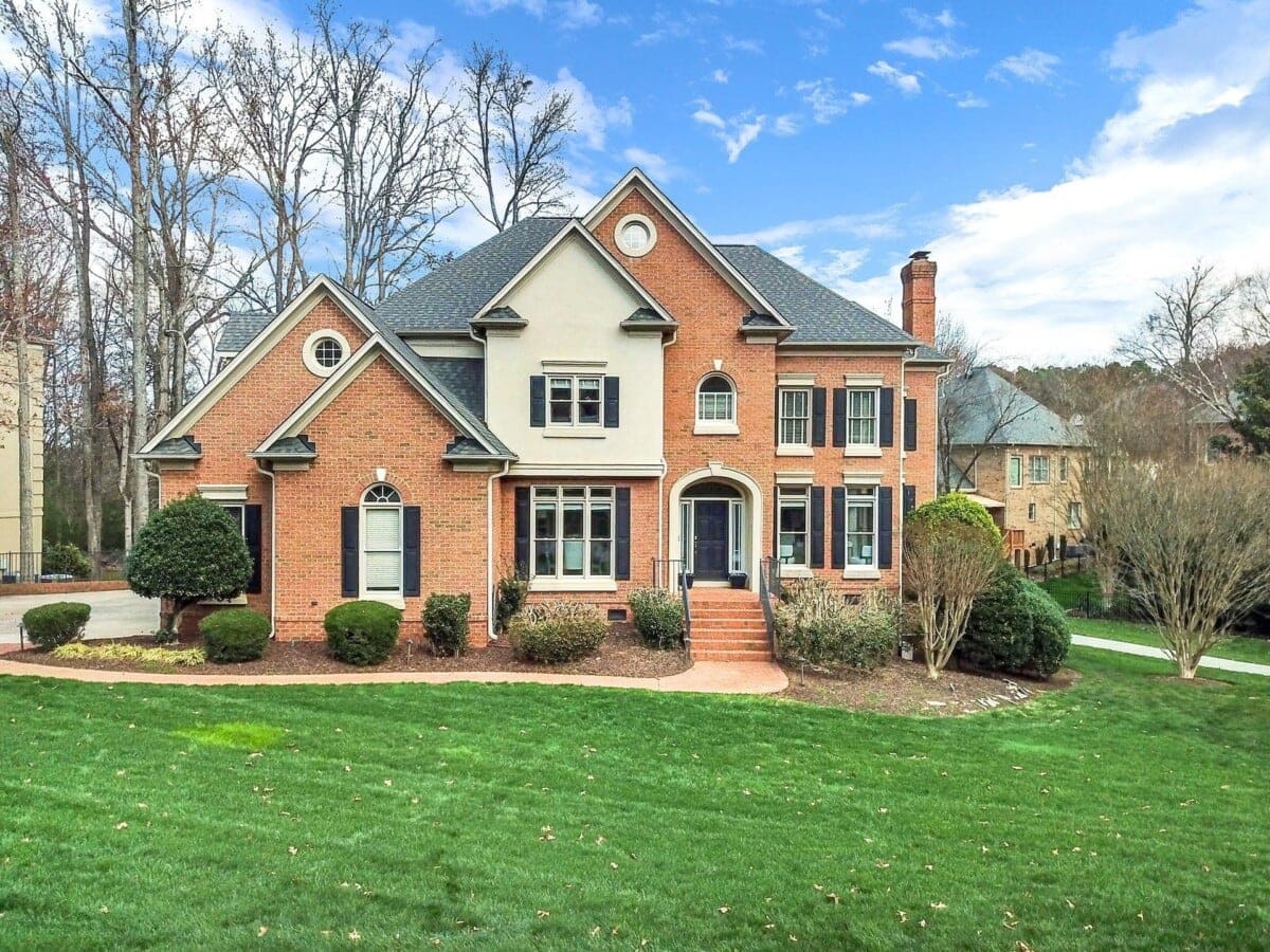 large-brick-home-with-lush-front-yard-in-ballantyne-charlotte-1.jpg