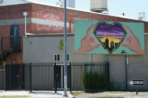 mural in front of a brick building in fresno