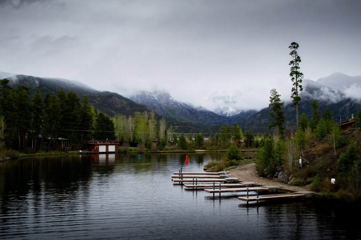 grand lake in colorado with clouds and boat docks