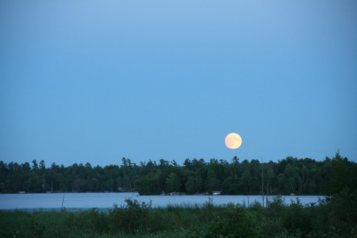 lake vermillion at night with moon in minnesota
