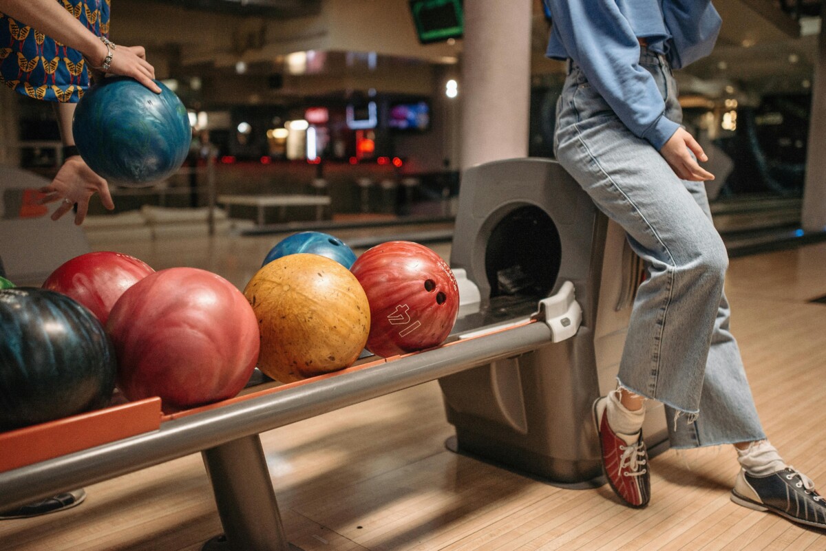 Friends bowling together