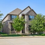 single family two story home brick