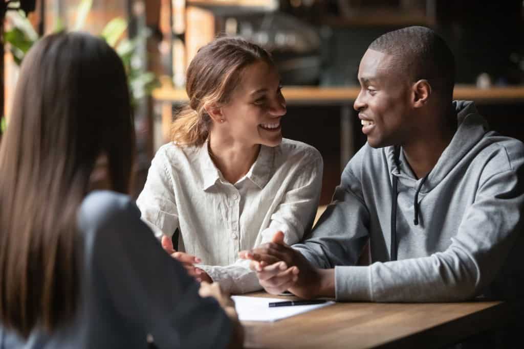 Couple finalizing the deal on their property abroad