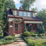 A picture of a beautiful brick home.