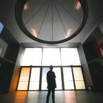 Man standing in large room